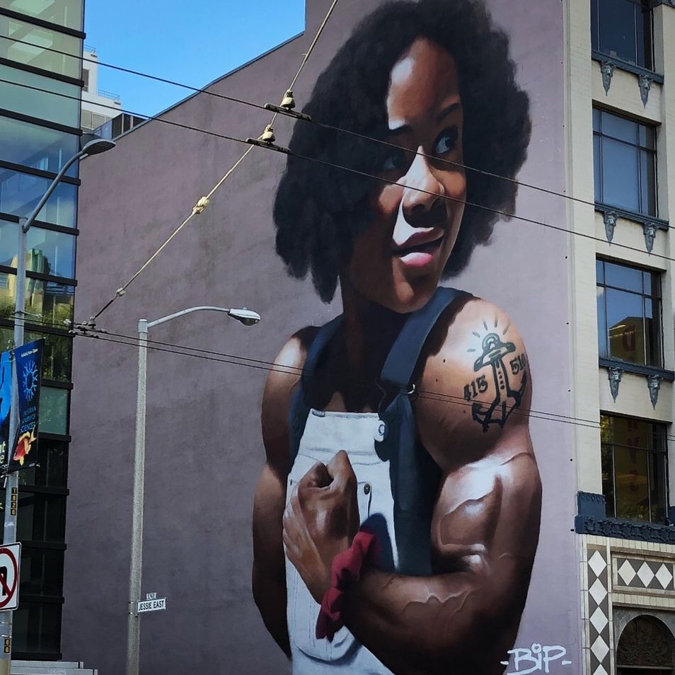 Graffiti einer jungen Person mit vielen Muskeln. 