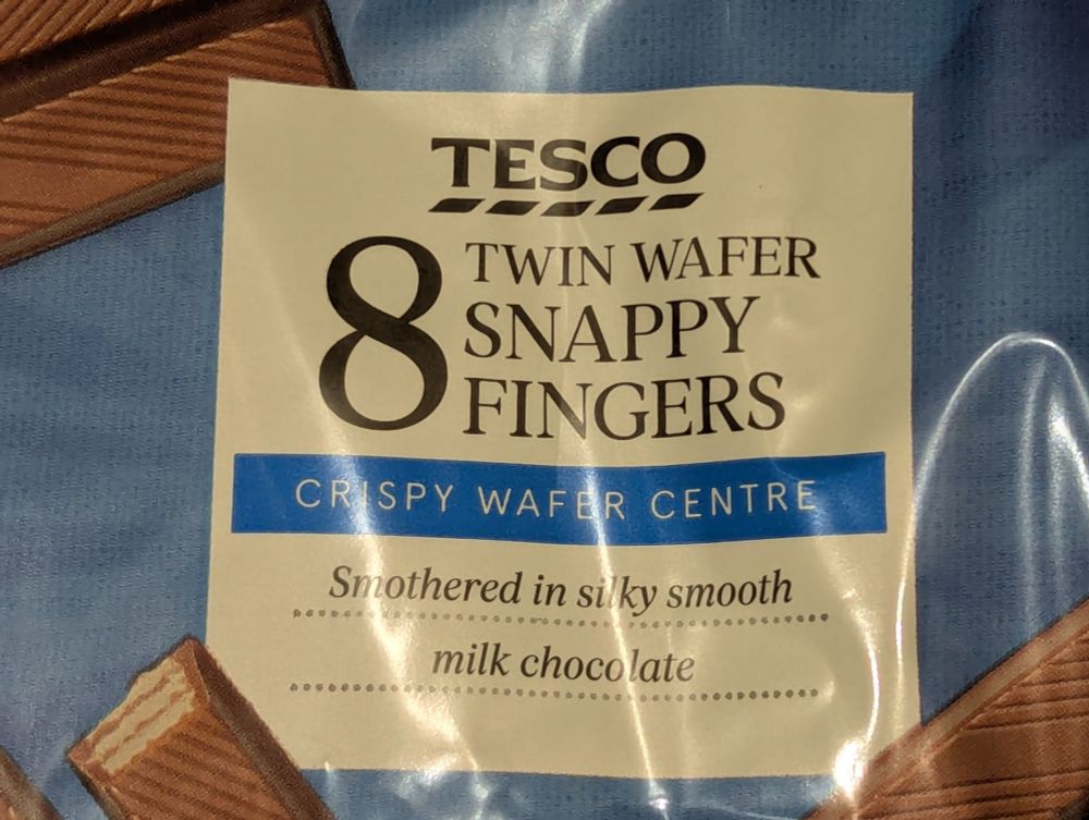 Image of Tesco own brand Kit Kats that are called "Twin Wafer Snappy Fingers"