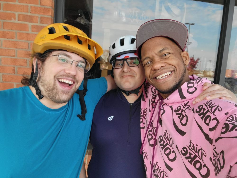 WobblyPython, Kindest Weapon,  and Ryyudo taking a selfie. 