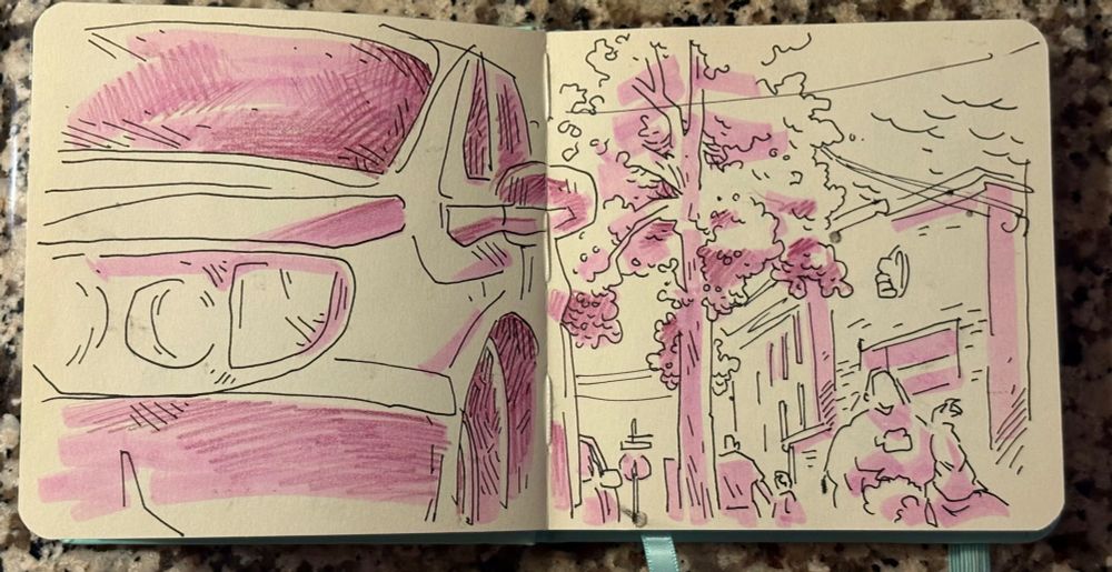 Drawn from the angle of sitting on a curb: a city neighborhood, with a car in the extreme fg n ppl on street.