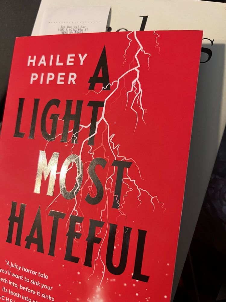 Red cover of Hailey Piper’s A Light Most Hateful