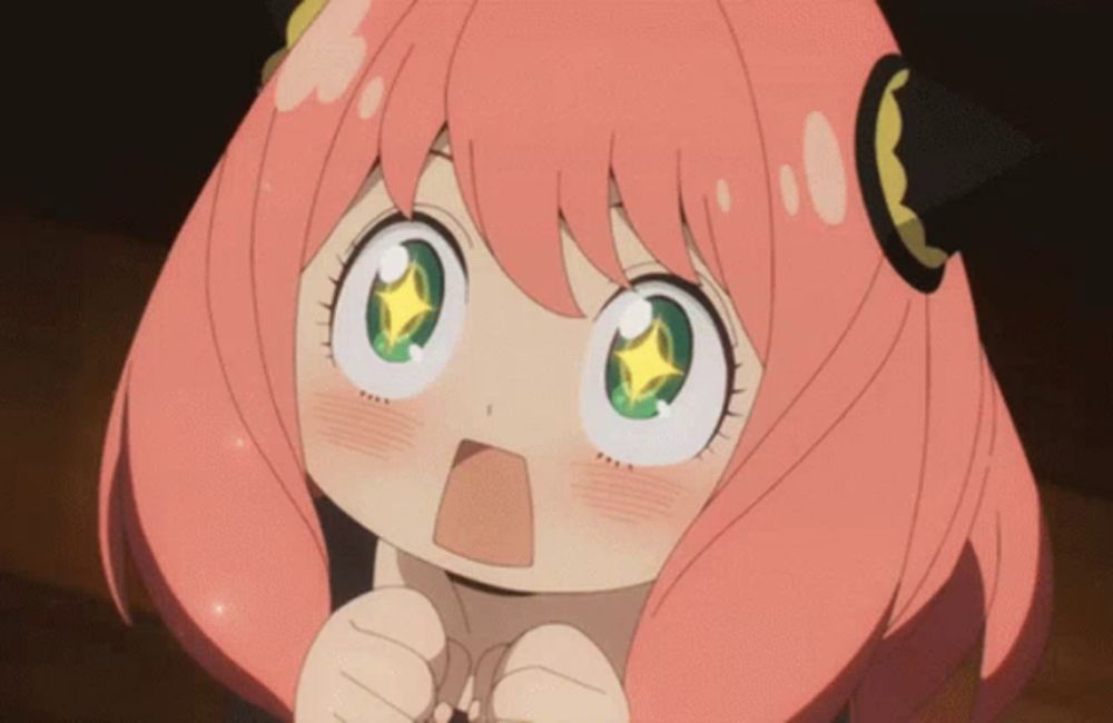 a little girl with pink hair and green eyes has a star in her eyes