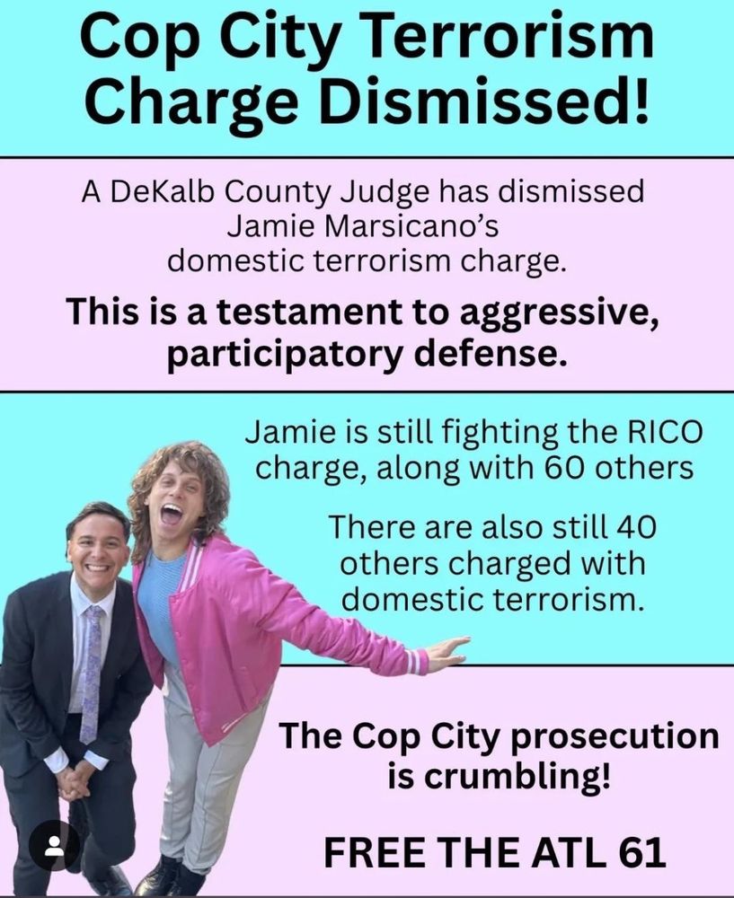 Image shows two people celebrating, with text announcing "Cop City Terrorism Charge Dismissed!" The text explains that a DeKalb County Judge dismissed Jamie Marsicano's domestic terrorism charge, calling it "a testament to aggressive, participatory defense." It notes Jamie is still fighting RICO charges with 60 others, and 40 others still face domestic terrorism charges. The image concludes "The Cop City prosecution is crumbling! FREE THE ATL 61"