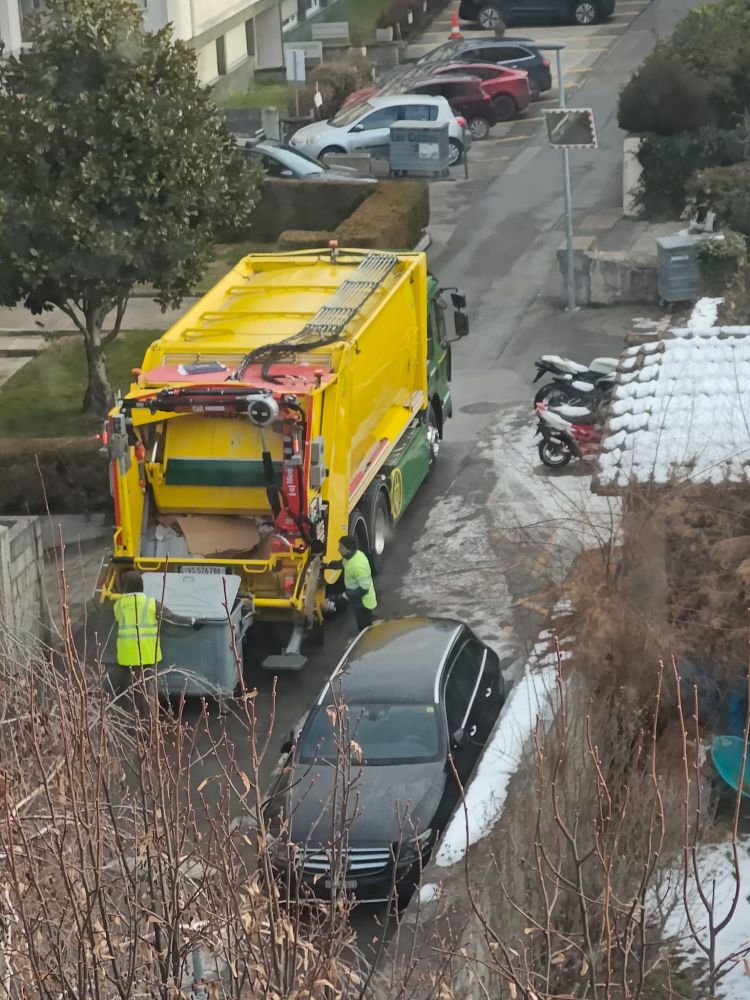 First electrical truck collecting refuse in my town.