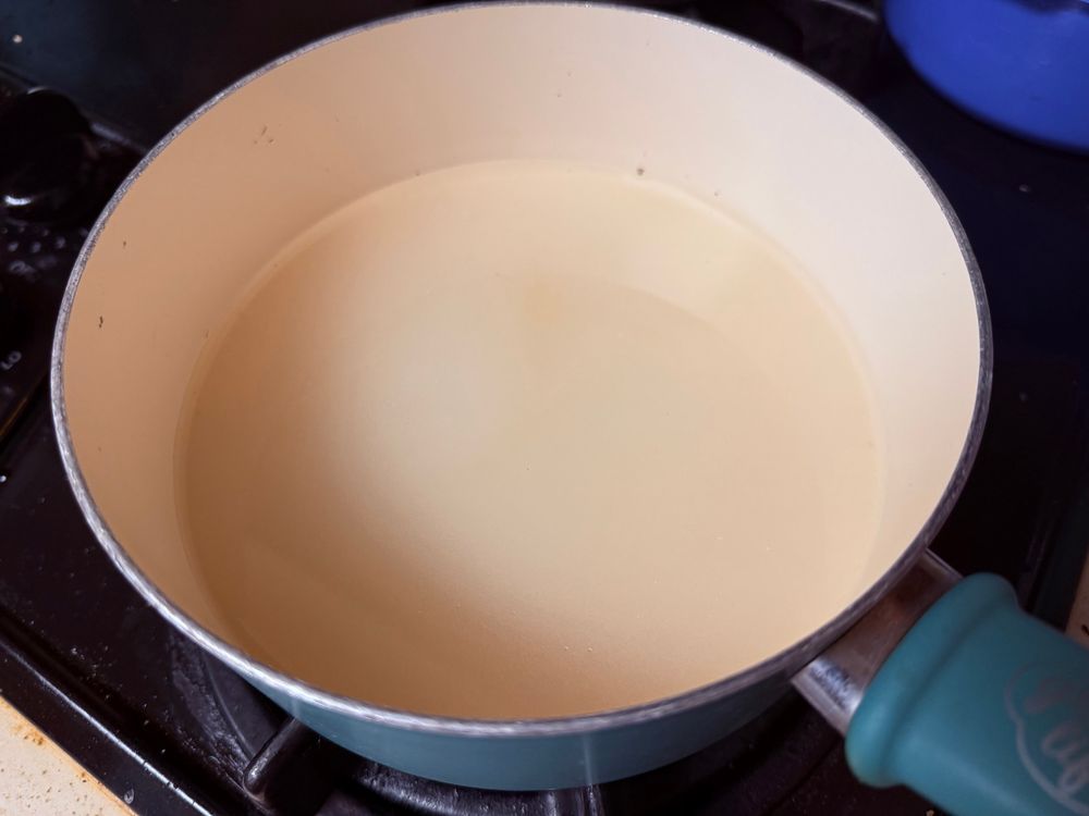 Sugar and water mixture in a pot. 