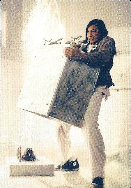 Chief in One Flew Over The Cuckoo's Nest lifting water fountain.