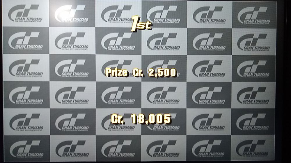 Gran Turismo 3, for the PlayStation 2 (PS2). Win screen. 2500 credits added to a total of 18,005.