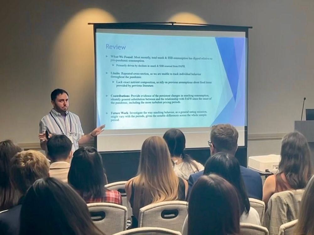 Me presenting my work. Sassily clocking my friend while I tell people to include me in their future research plans haha