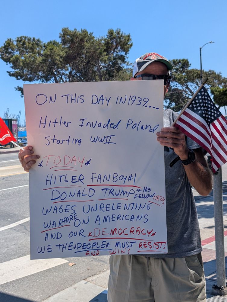 Man with sign 