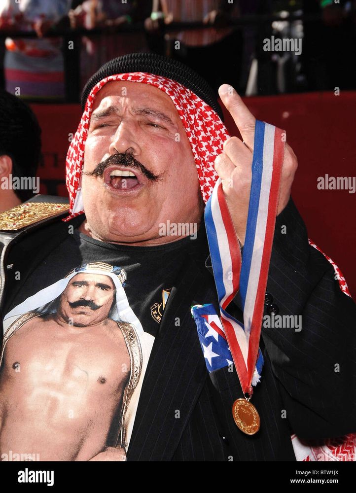 Iron Sheik, wherever he is, excitedly receiving the news of Hulk Hogan's death 