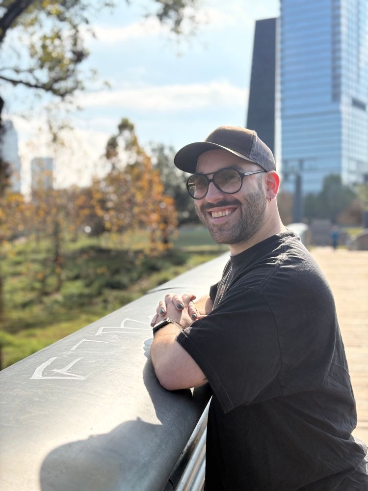 Me in a black tee shirt, black hat, and sunglasses