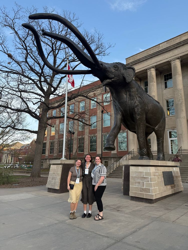 Mackenzie, Jasmine, and Olivia under the mastodon on UNL’s campus 