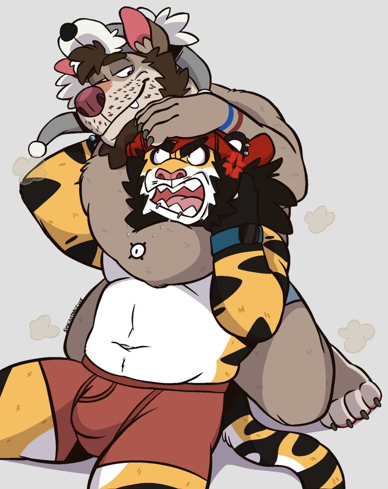 Photon holding Khary in a playful headlock 