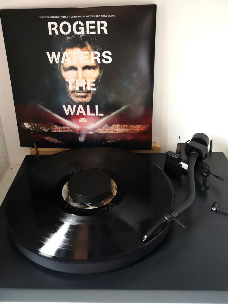 Vinyl Album Roger Waters - The Wall. Black Vinyl on a Black Turntable