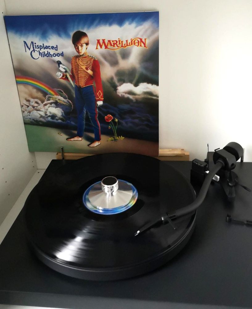 LP Misplaced Childhood by Marillion. Black Vinyl on a Black Turntable.
