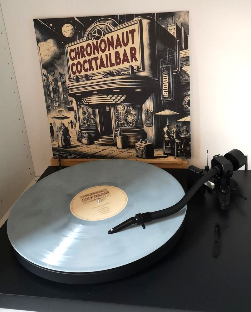 "Chrononaut Cocktailbar" / "Flight Of The Sloth" by No Man's Valley. 2024. Blue-ish Vinyl on a Black Turntable