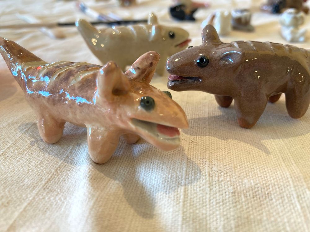 ceramic dogs that look like loaves of bread