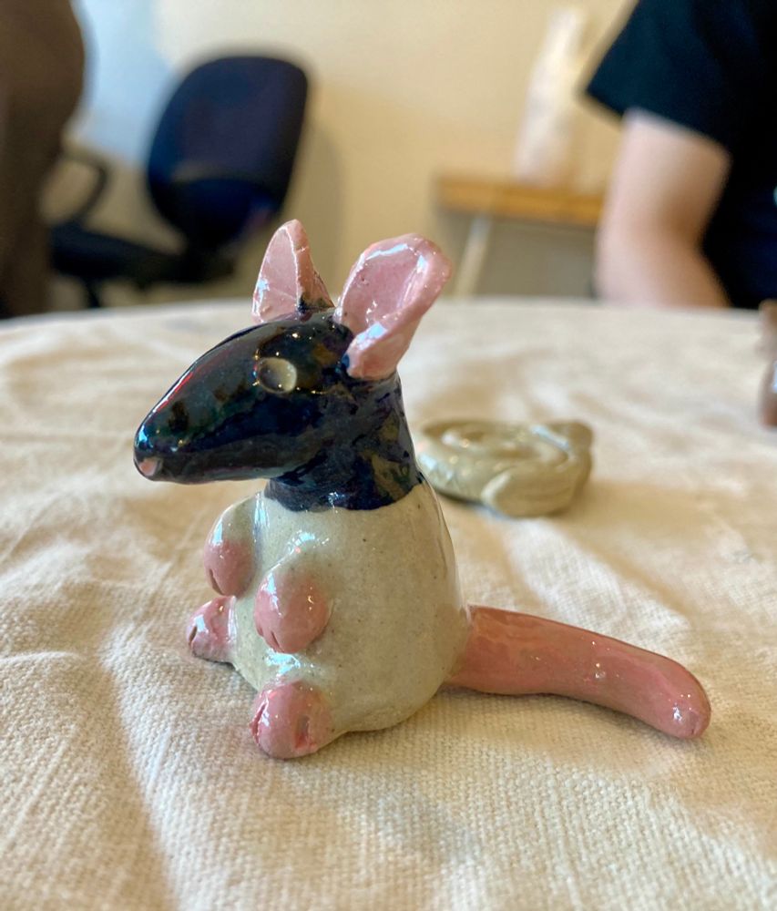 ceramic rat sitting up