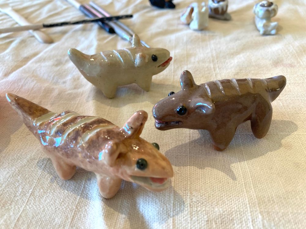ceramic dogs that look like loaves of bread