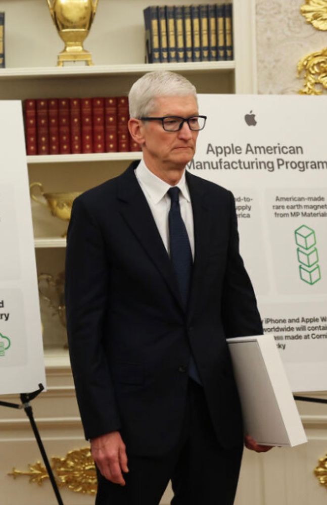 Tim Cook in the corner after appeasing a bully looking like a Pinocchio ass puppet with it’s strings cut