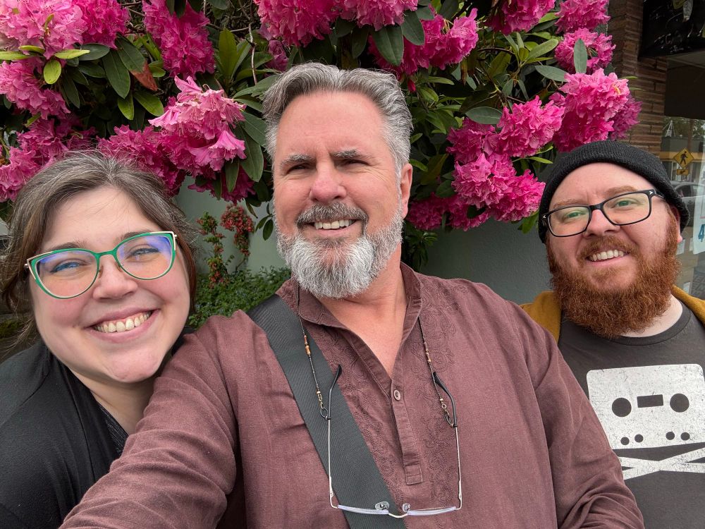 Mike, Erin and David. I’m the one with the beard. Ah, the one with the gray beard.