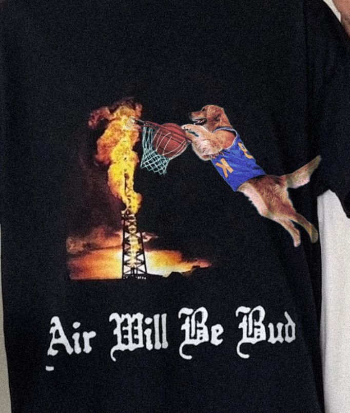 T-shirt with Air bud dunking into an oil rig  with the text "Air will be bud" on it. 