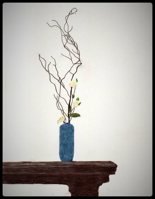 A colored pencil drawing of a tall arrangement of bare branches in a blue vase with an arrangement of 3 white flowers among the branches. Sitting on a dark wood table.