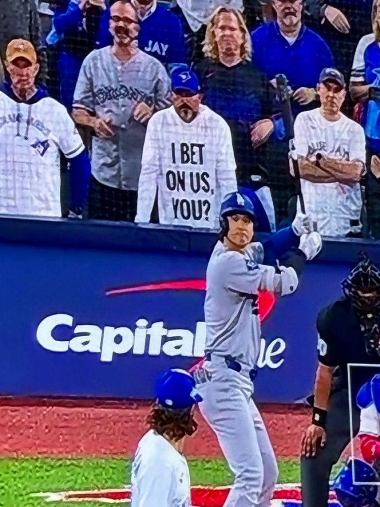 I bet on us, you? Shirt on Aka the butt plug guy is behind home plate at the World Series while shohei ohtani bats