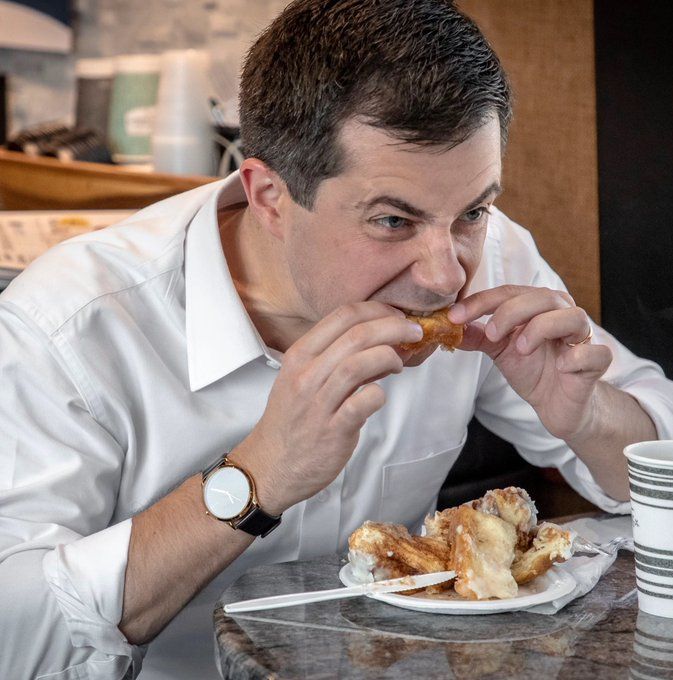 Pete Buttigieg going to town on a cinnamon bun, you can almost hear the glomglomglom