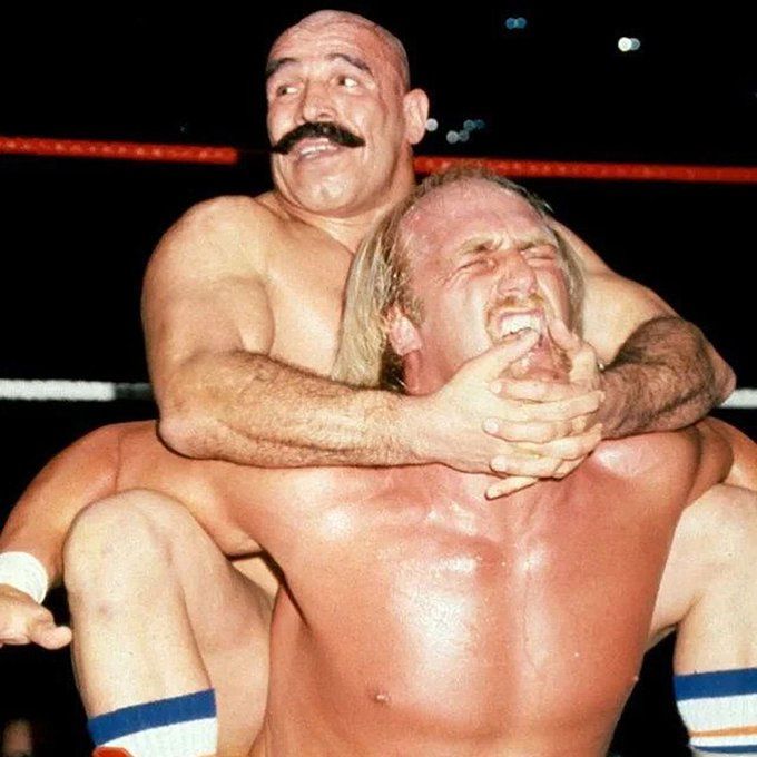Iron Sheik with the camel clutch on Hulk Hogan