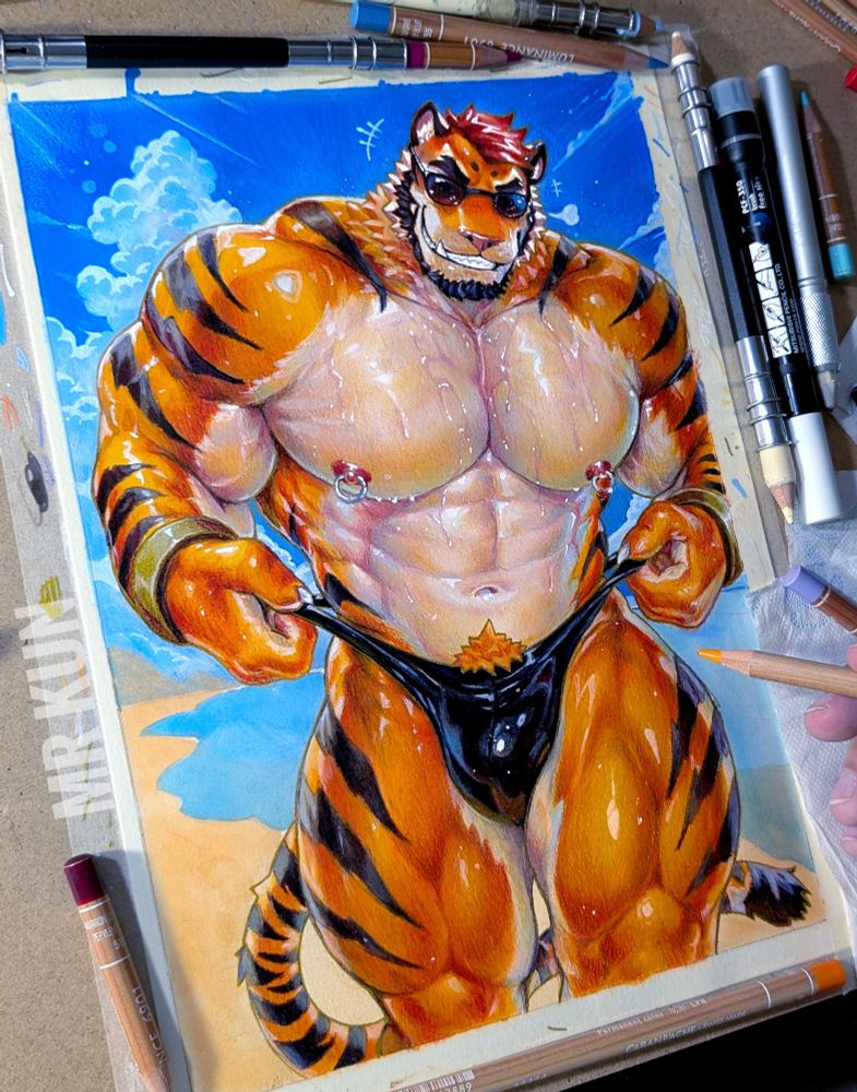 A traditional handmade painting of an anthropomorphic muscular tiger man under a bright blue sky with fluffy clouds. His orange fur glistens as if oiled, highlighting his broad chest, sculpted abs, and thick thighs. He's wearing a tight, glossy black swimsuit that clings to his bulge and stretches over his body, accentuating every curve of muscle. Sunlight bounces off his slick fur, making him look like he's glowing. Various art tools like pencils, markers and extenders lay scattered around the painting. 
