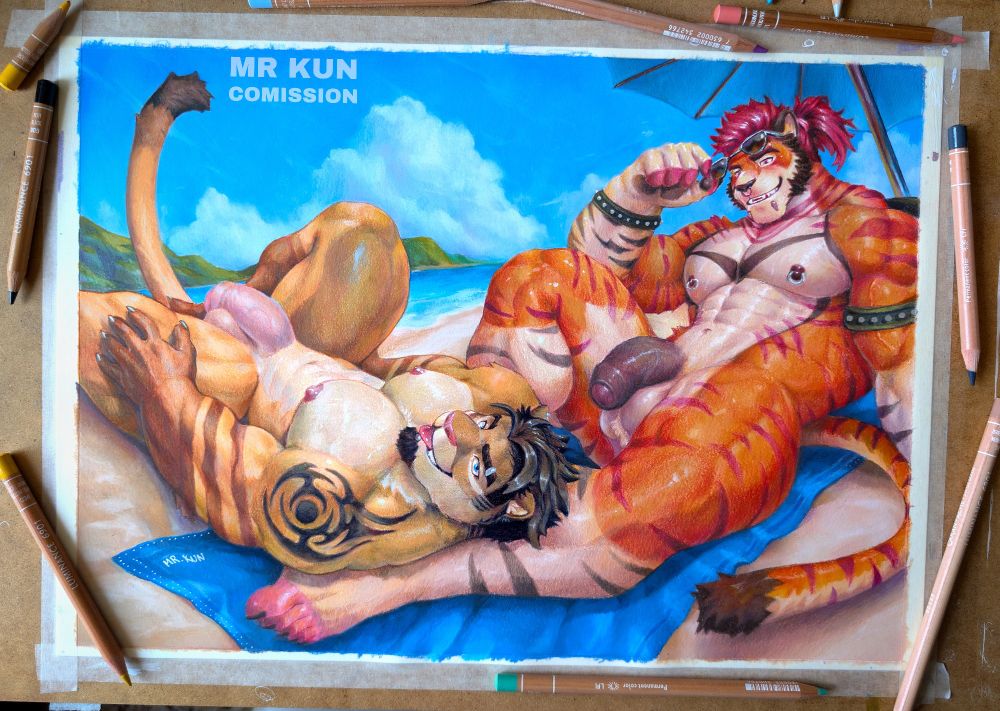 A highly detailed traditional illustration of two muscular anthro feline men relaxing on a beach. On the right, a tall orange tiger with red hair tied in a ponytail sits confidently under a beach umbrella while removing his sunglasses sunglasses. He has one leg extended. On the left, a tan-furred puma man lies on the tiger's thick leg, looking at the viewer with a playful blep. The scene is sunny, warm, and filled with sensual energy, with the sparkling ocean and green hills in the background. Color pencils surround the taped-down painting. 