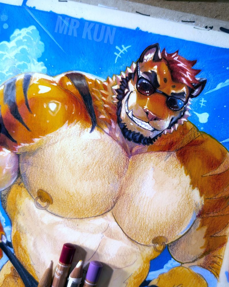 A traditional handmade illustration of a muscular anthropomorphic tiger man wearing sunglasses. His glistening orange skin is contrasted by the blue sky. Half of his body is still unfinished . There's color pencils and a blending tool at the lower middle part of the photo.  