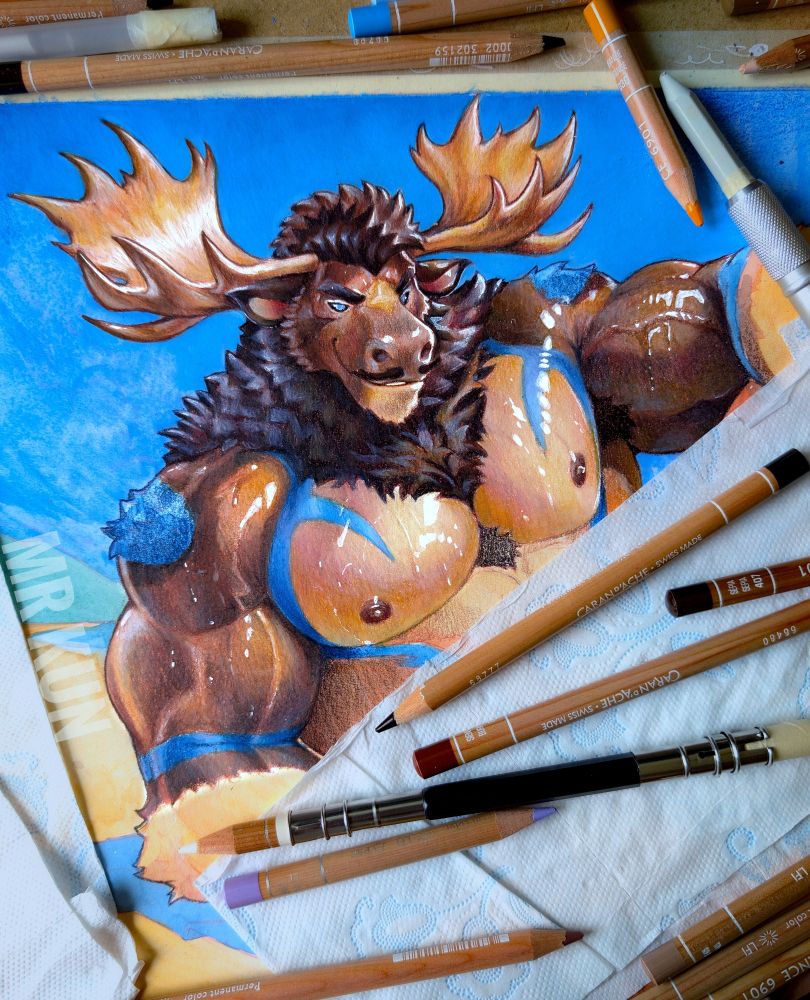 A traditional colored pencil artwork of a muscular, anthropomorphic moose man. His shiny, oiled-up fur and exaggerated physique emphasize his brawny chest and arms. His fur is brown, with blue pines and some lighter, cream-colored areas on arms and chest. The drawing is surrounded by various Caran d’Ache pencils, a blending tool, and textured paper towels