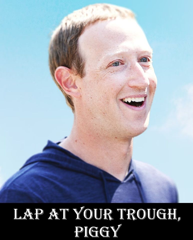 Photo of Mark Zuckerberg head and shoulders, wearing a blue shirt, he is smiling mouth open showing his upper set of teeth. The background is a light blue sky with wisps of cloud. (Source of photo: Getty via the Atlantic)

A caption below white on black in Algerian reads:
"LAP AT YOUR TROUGH, PIGGY"