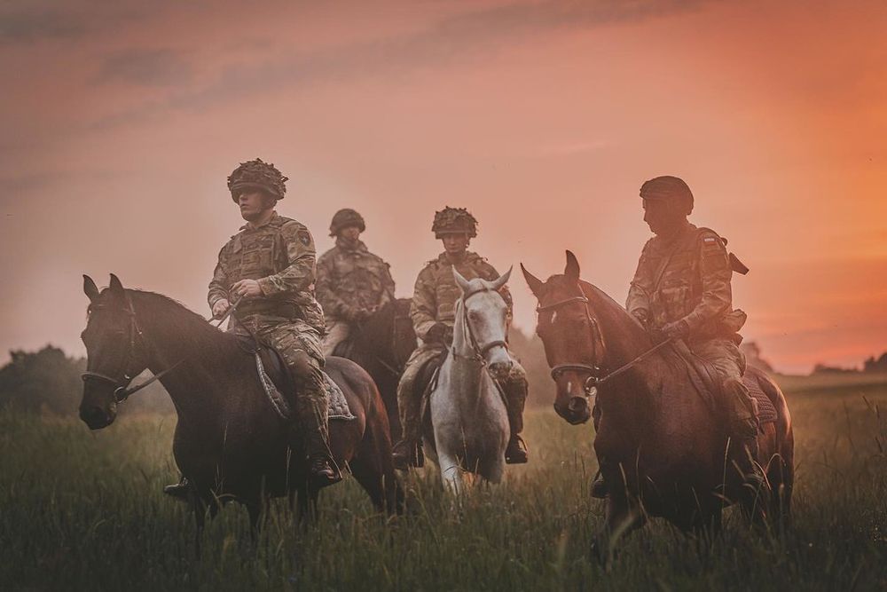 Polish and British soldiers train together on the Eastern Flank and conduct literal mounted patrols on horseback