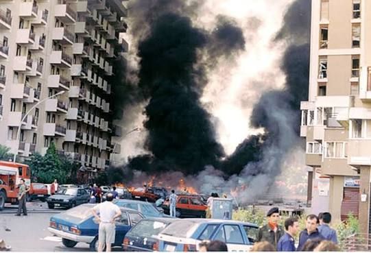 A view of via D'Amelio in Palermo, minutes after the explosion of the car bomb planted by Cosa Nostra.