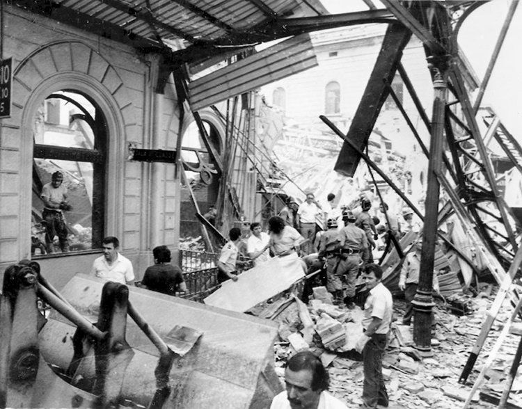 The collapsed structure of the waiting room and cafeteria of Bologna Station following the explosion.