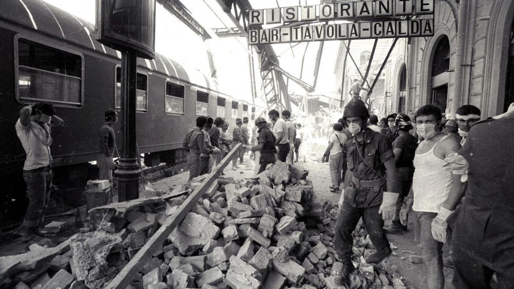 Rubble and rescue workers on Platform 1 of Bologna Station following the bomb attack.