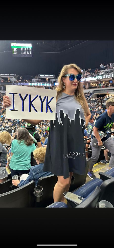 Fan wearing a Mpls skyline dress 
