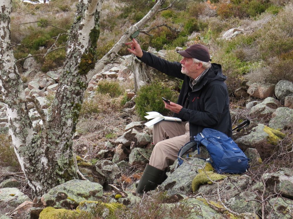 Dr Alan Knox (SOC Council member), checking a sound recorder, Aberdeenshire