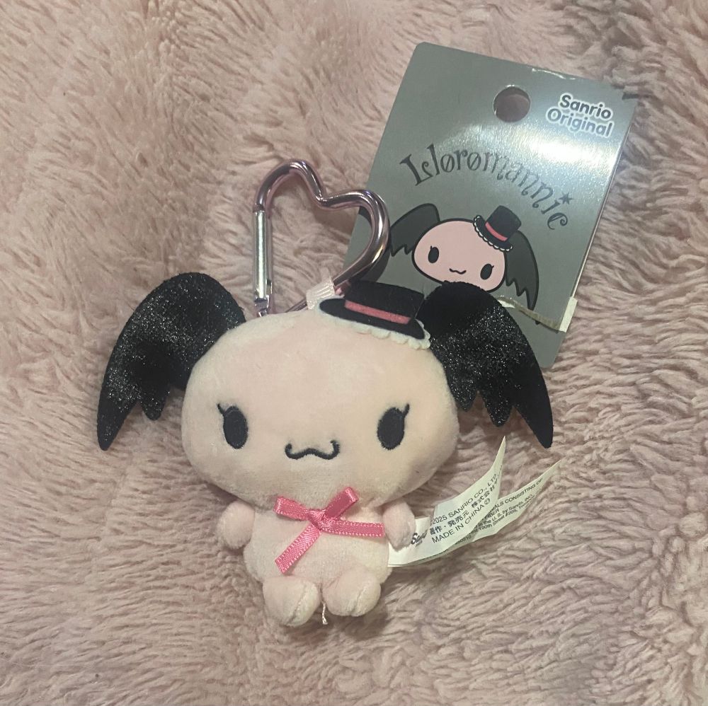 A keychain of Cherry, she is one half of a demon duo from Sanrio 