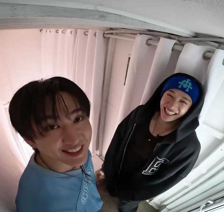 High angle picture of changbin and chan being all smiley and cute