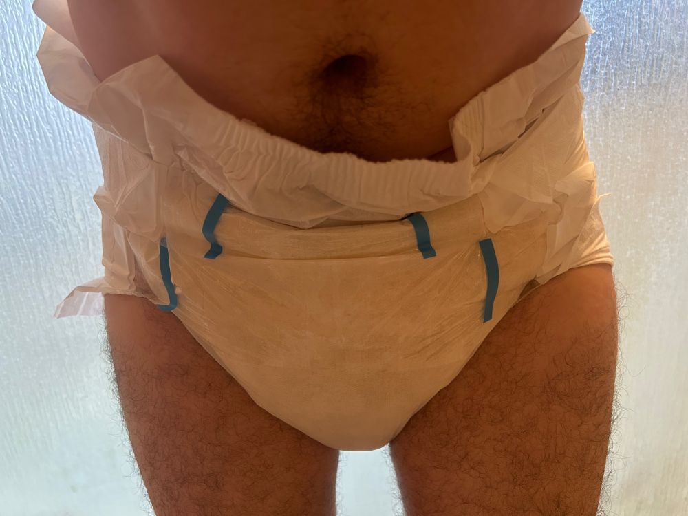 Guy in a wet Str8up diaper, size medium, view of front.