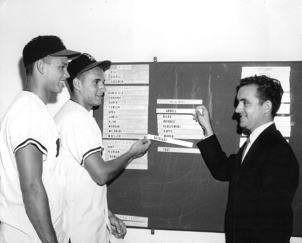 Los Angeles Angels executive Roland Hemond (right) talks with two 1961 USC bonus babies fresh from the 1961 College World Series championship, first baseman Dan Ardell (far left) and third baseman Tom Satriano (near left), whom he signed that July. (COURTESY OF DAN ARDELL)