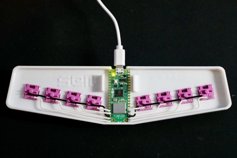 The wiring for my 8-key mechanical keyboard where you type piano-style chords of binary values representing the ASCII table.