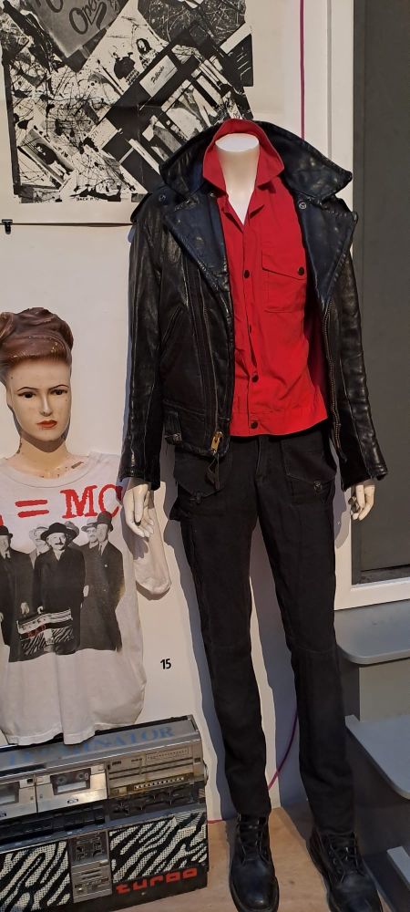 Clothes and exhibits from mick jones of the clash’s rock and roll public library exhibition 
