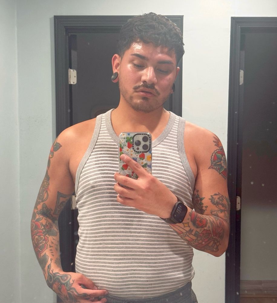 Post workout Selfie 
Dirty mirror 
Very sweaty 
Very tired 