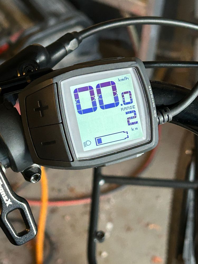 Ebike display showing 2km range left on battery