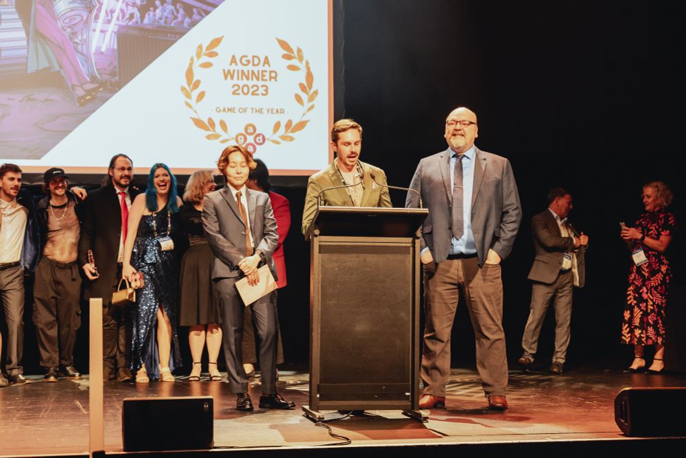 Accepting the Game of the Year AGDA for Stray Gods in Melbourne Australia.